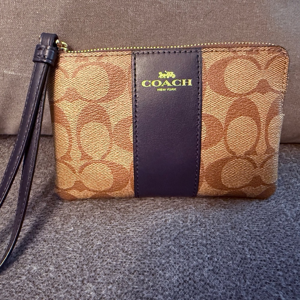 Coach Wristlet Signature Tan with Blue Stripe on Front EUC